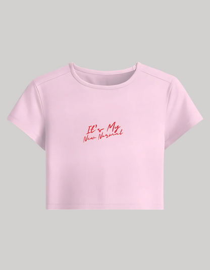 Women’s Baby Tee – “It’s My New Normal” Slogan | Stretchable Fit | 240 GSM Cotton-Spandex | Gen Z Style | Bio-Washed & Pre-Shrunk